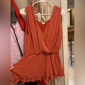 Orange/Red Short Romper Women’s size XL fits more like a L